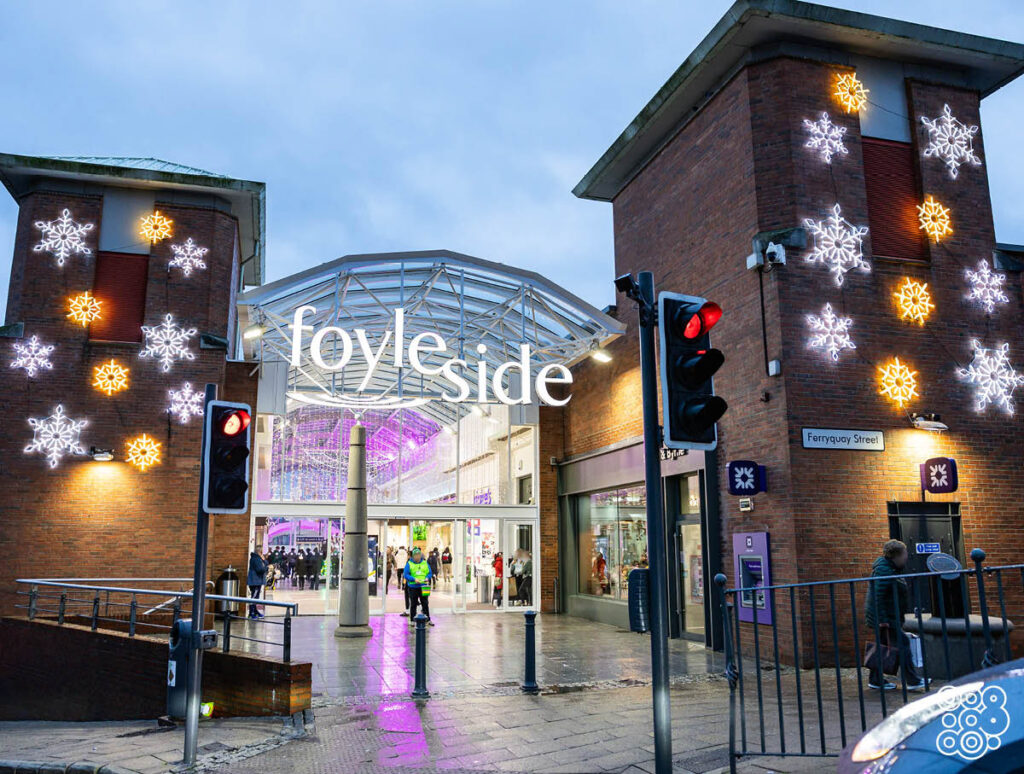 external wall of shpping mall with light decorations