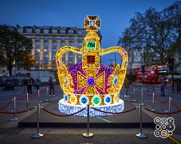 in the middle of a square a giant lighting crown stands out